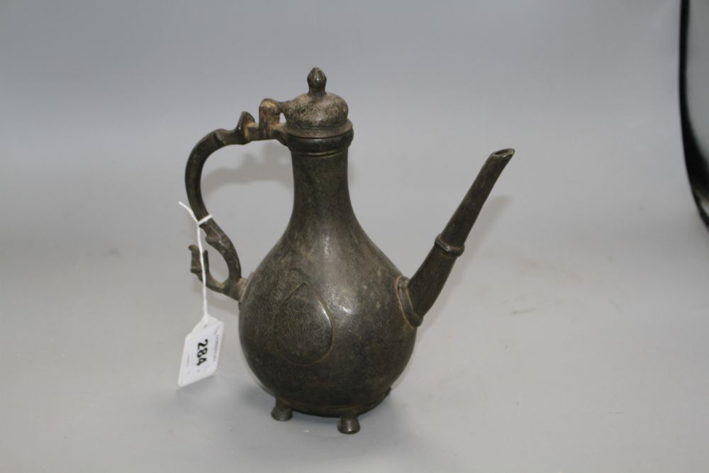 Two late 18th century Mughal brass ewers, H.11in. and 9.75in.